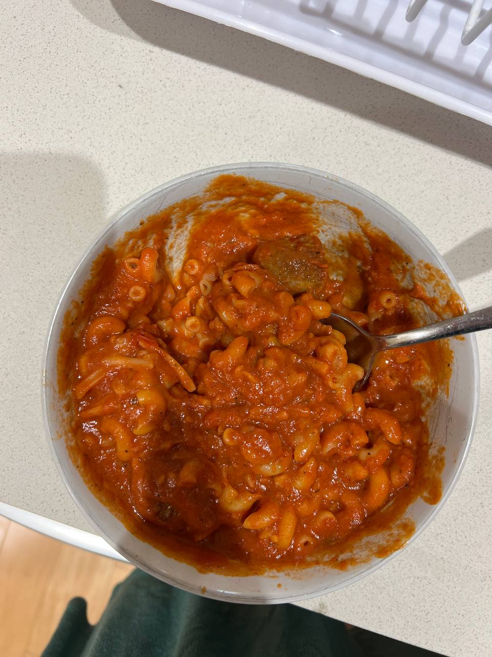 post-ride pasta with sauce and pork sausage