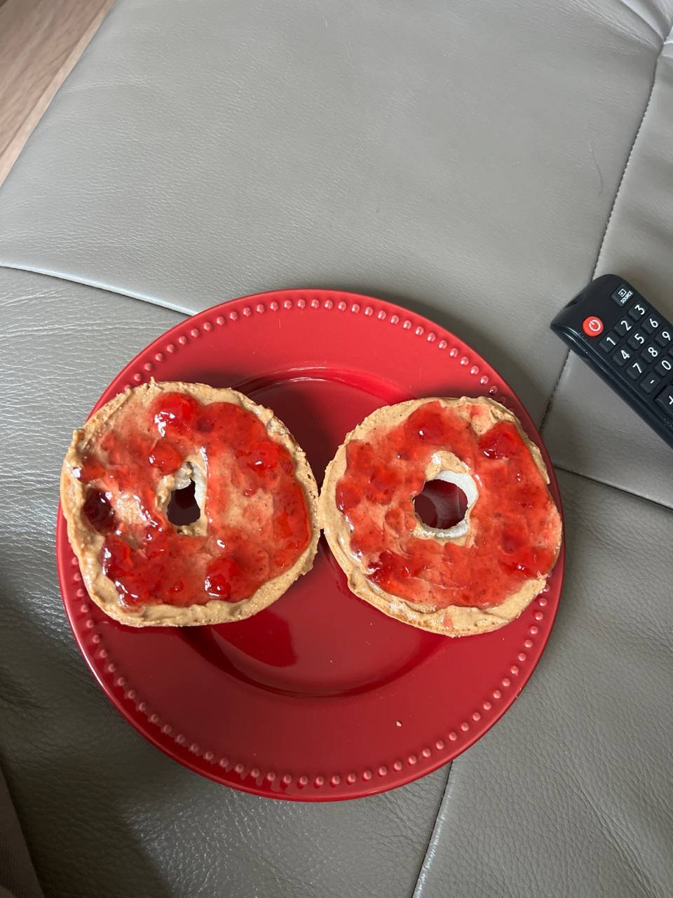 Plain toasted bagel, Peanut butter, Strawberry jam