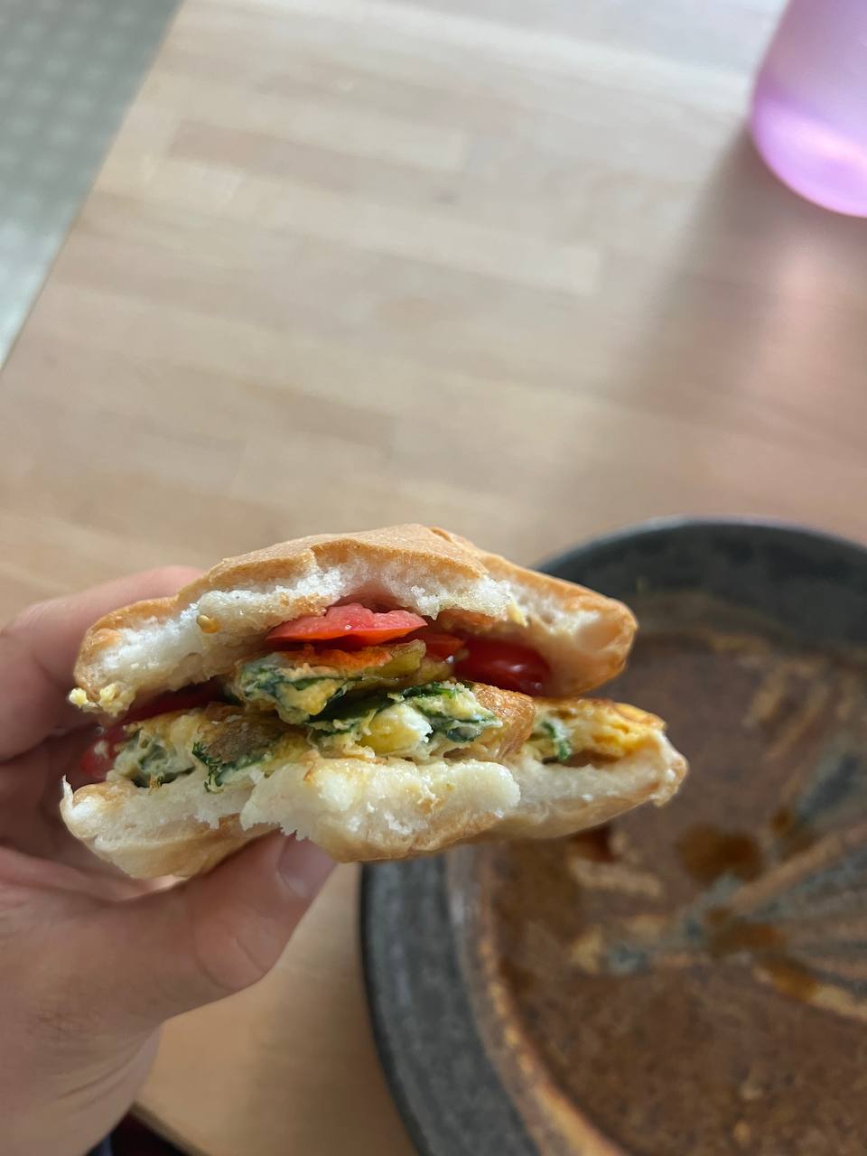 Gluten-free bagel (toasted), Scrambled eggs with wilted spinach (2 eggs), Sliced tomato