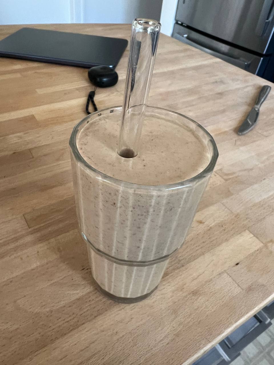 Recovery smoothie with dates, banana, almond milk, chia seeds, peanut butter, and protein powder