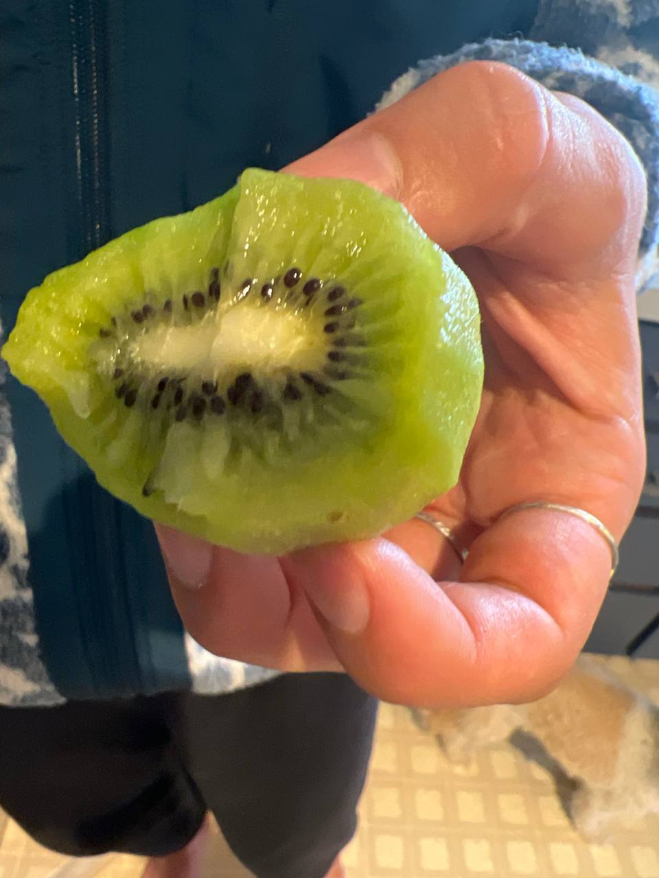 Green kiwi (partially eaten)