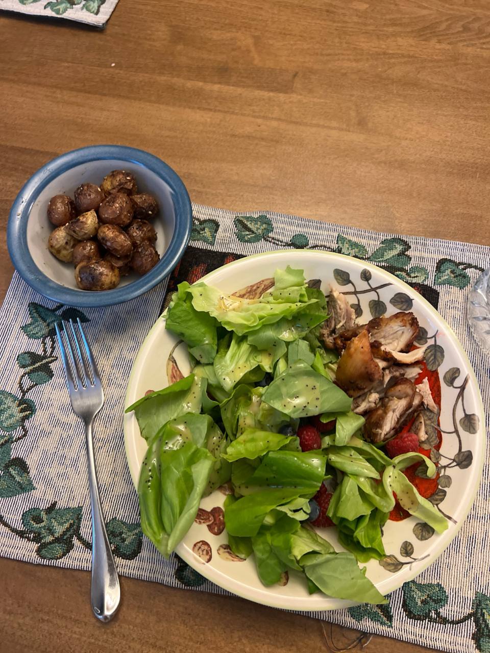 Roasted baby potatoes, Green salad with strawberries and low-fat lemon poppy seed dressing, Roasted chicken thigh