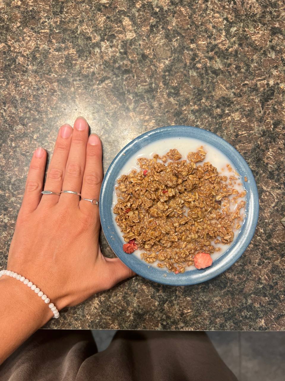 Granola, Almond milk, Small strawberry pieces